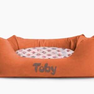 Cama para mascotas en color Teja con cojín Rombos Rosa con bordado
