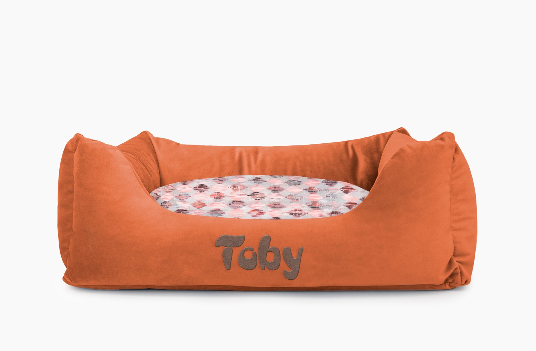Cama para mascotas en color Teja con cojín Rombos Rosa con bordado